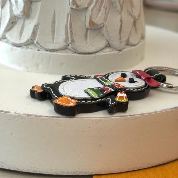 Coach Penguin Keychain with Red Bow and Scarf - Picture 4 of 9